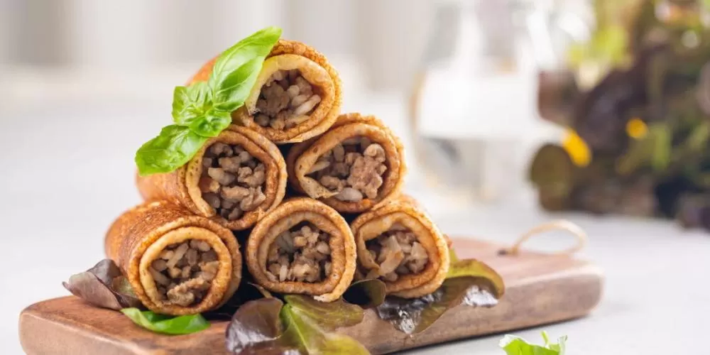 Receita de Panquecas de carne moída cremosa e fácil de fazer.