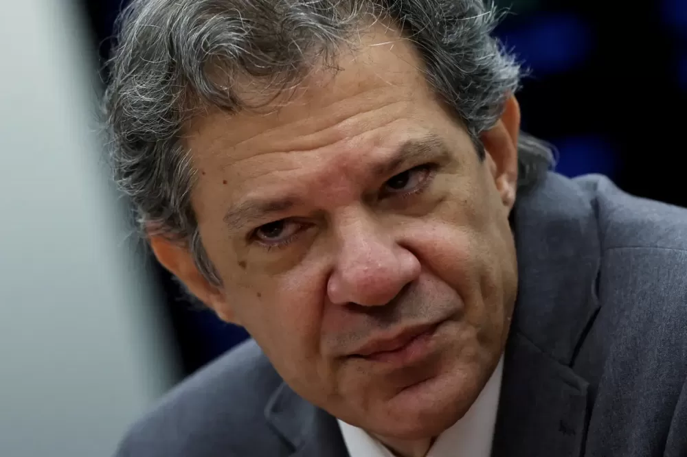 Haddad diz que baixaria juros e que parte do mercado financeiro torce contra o Brasil