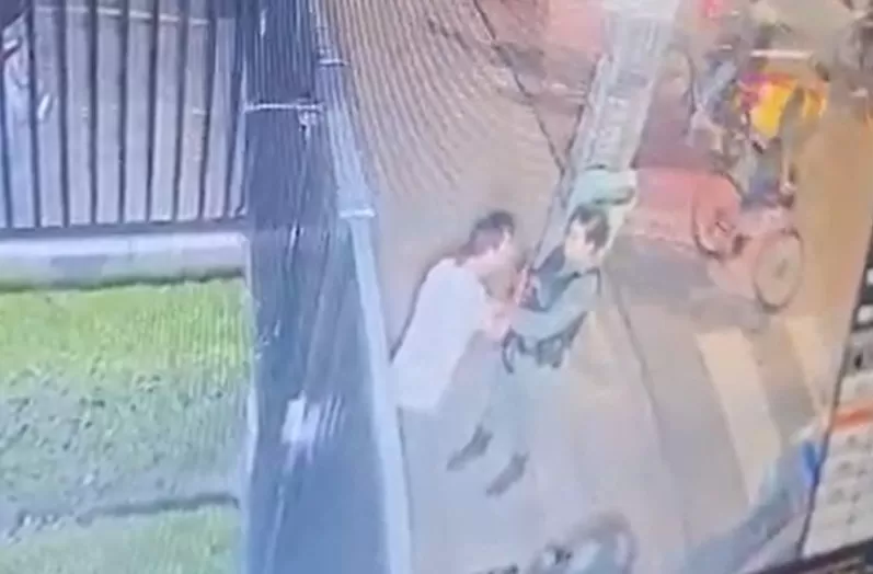 Criança filmou mãe tentando tirar arma de companheiro antes de ser baleada em apartamento nas Graças.